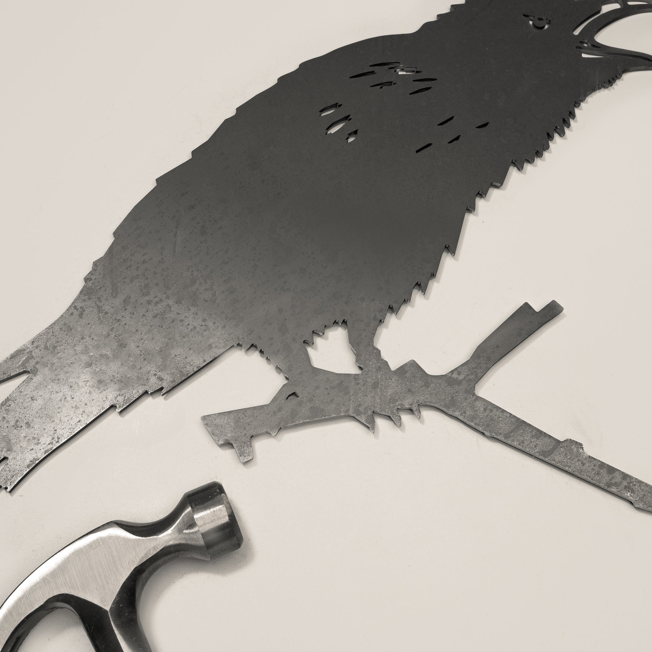 The Boo-tiful Bundle 🎃 by Metalbird UK features a Corten steel raven bird cutout on a branch—ideal for adding rustic Halloween charm to your garden decor.
