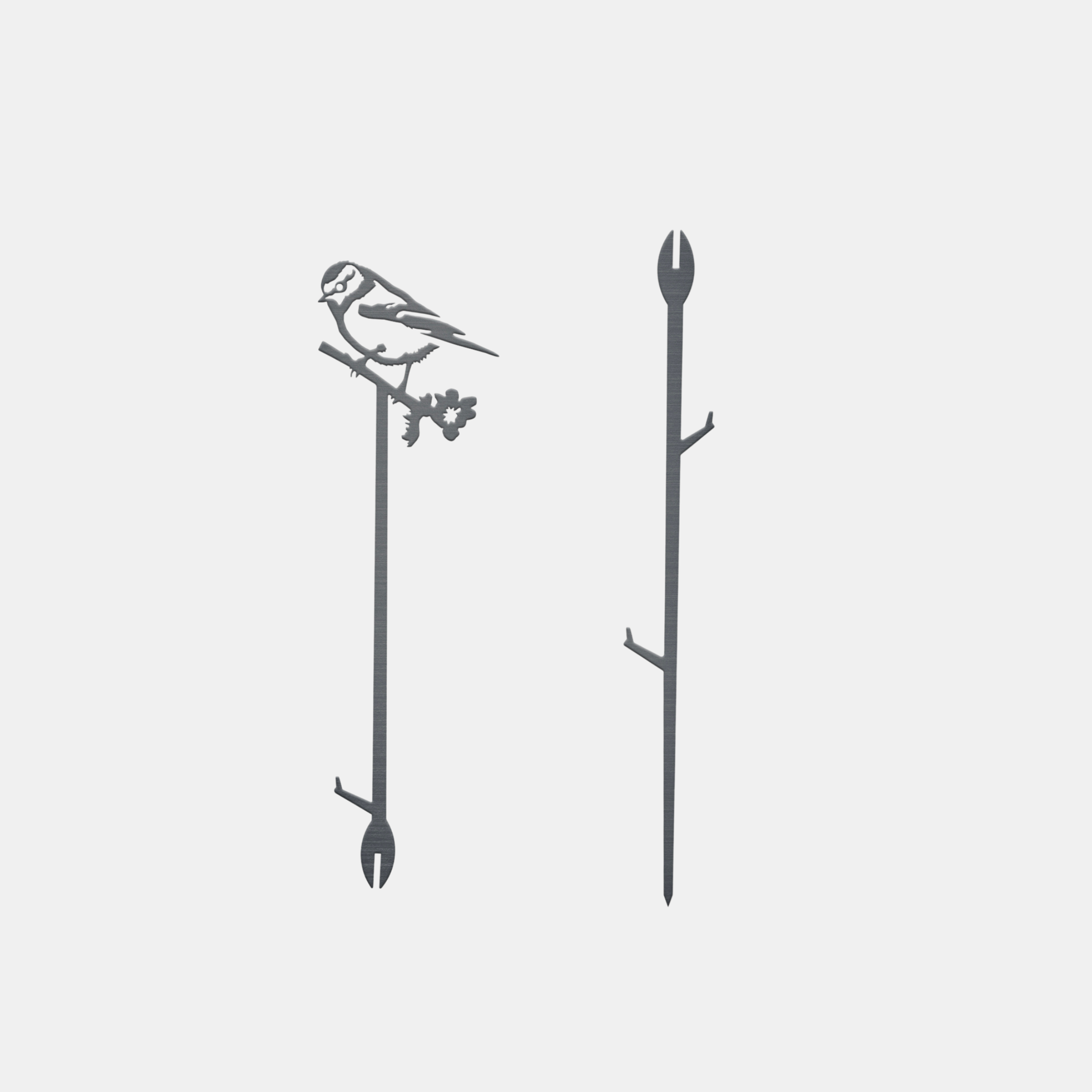 The Metalbird UK Pair Of Plant Stakes includes two black metal stakes: one with a bird and squirrel on a branch, the other with branching supports. Both have pointed ends for easy ground insertion and add charm to your garden.