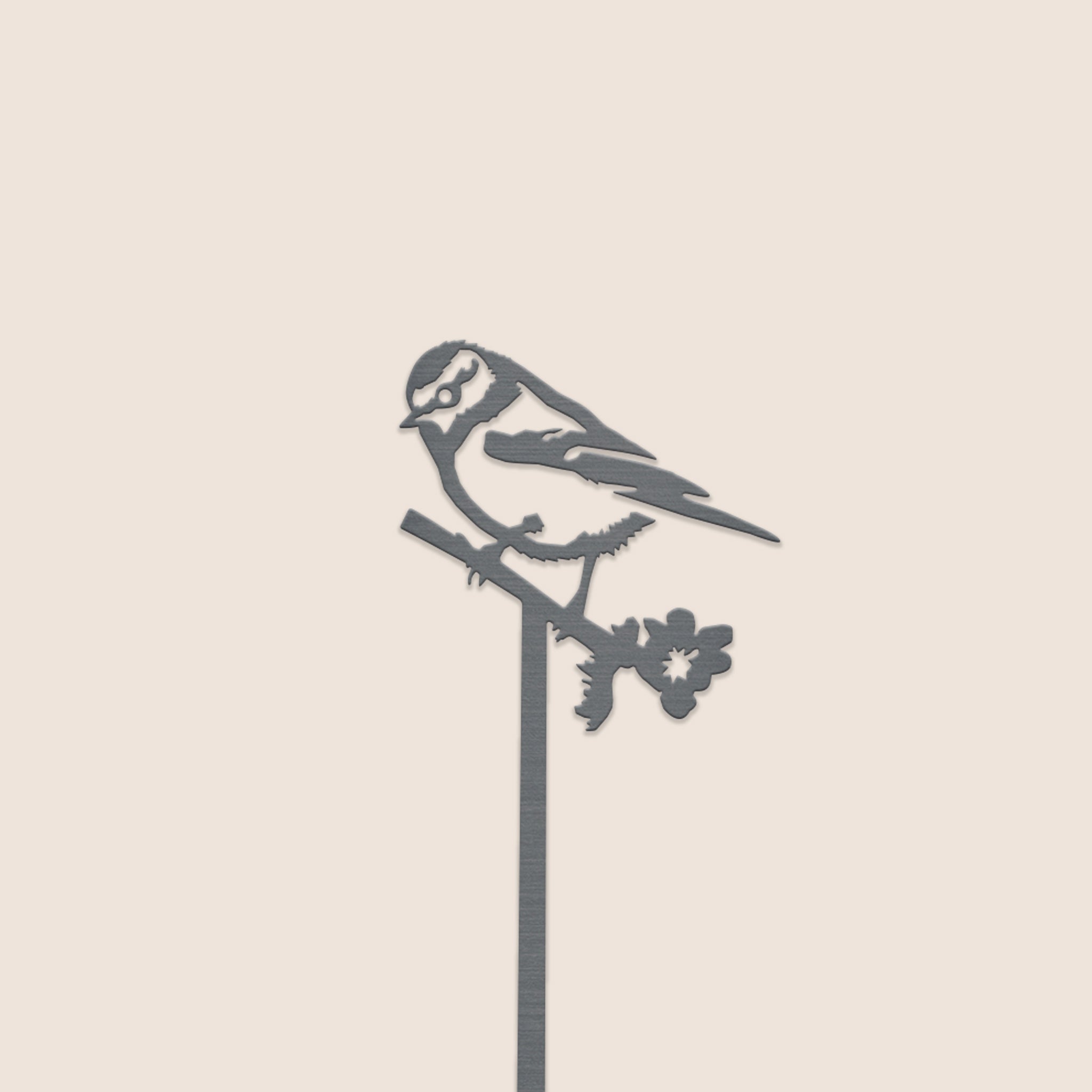 The Blue Tit Plant Stake (70cm) by Metalbird UK features a minimalist metal songbird perched on a branch with a flower—an elegant garden art piece that stands out against any plain light beige background.