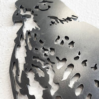 Close-up of Metalbird UK’s discounted “Metalbird Seconds - Black Stilt” wall art, featuring a cutout of a bird’s head and upper body—part of our unique garden bird decor collection.