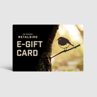 The Metalbird UK Gift Voucher features “Metalbird Gift Voucher” text and an image of a metal bird silhouette on a branch—an ideal present for fans of unique yard art.
