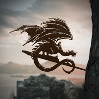 The FELL BEAST™ by Metalbird UK is a premium metal dragon silhouette with wings extended, mounted on a tree for dramatic yard art—an ideal gift for fantasy lovers and a striking feature in any outdoor setting.