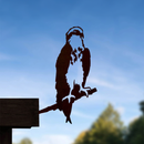 The Osprey - Seconds by Metalbird UK is a corten steel silhouette of an osprey perched on wood against a blue sky, making it the perfect metal gift for nature lovers.