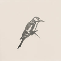 A minimalist, monochrome Great Spotted Woodpecker by Metalbird UK, shown perched in profile against a light background—ideal garden art or gift, inspired by the sleek lines of corten steel sculptures.