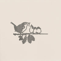 The Metalbird UK "Wren and Chicks" is a grayscale silhouette of a bird feeding two chicks on a leafy branch, set against a plain background—a heartfelt gift for any occasion.