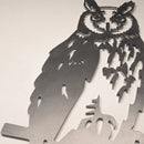 A close-up of the Long-eared Owl metal cutout by Metalbird UK highlights its detailed patterns and textures against a plain, light background.