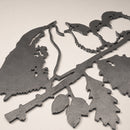 The Metalbird UK "Wren and Chicks" is a stunning metal silhouette artwork of wrens on a branch—ideal for unique yard decor or as a thoughtful gift.