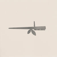 A minimalist illustration of the Stick Feeder by Metalbird UK features a striking silhouette resembling a Swiss Army knife with a blade, key, and leaves against an off-white background.