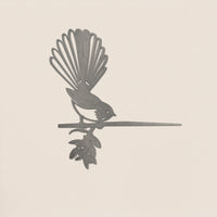 Fantail (Piwakawaka) by Metalbird UK is a corten steel silhouette of a bird with a fanned tail perched on a leafy branch—ideal as unique garden art.