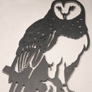The Barn Owl by Metalbird UK is a metal cutout silhouette of an owl perched on a branch, featuring stylized perforated feather and face details—an eye-catching piece for your garden or wall.