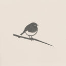 A minimalist monochrome silhouette of a robin perched on a thin branch by Metalbird UK, set against a plain light background. Soft-edged shapes make it ideal as modern yard art or a unique gift.
