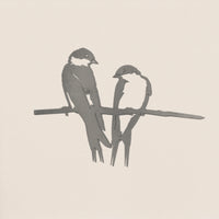 The Pair of Swallows by Metalbird UK features a minimalist design of two birds on a branch in simple gray lines, set against a light background—an elegant choice for yard art or as a thoughtful gift.