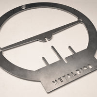 A brushed metal Hanging Feeder by Metalbird UK features a minimalist bird perched on a branch within a circular frame, with "METALBIRD" cut out at the base—an eye-catching sculpture ideal for unique garden art.